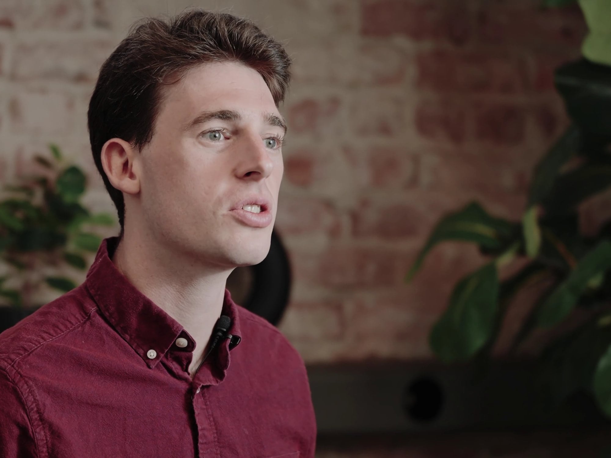 Close interview framing of the Martian cofounder in the red shirt, Martian Ship launch film